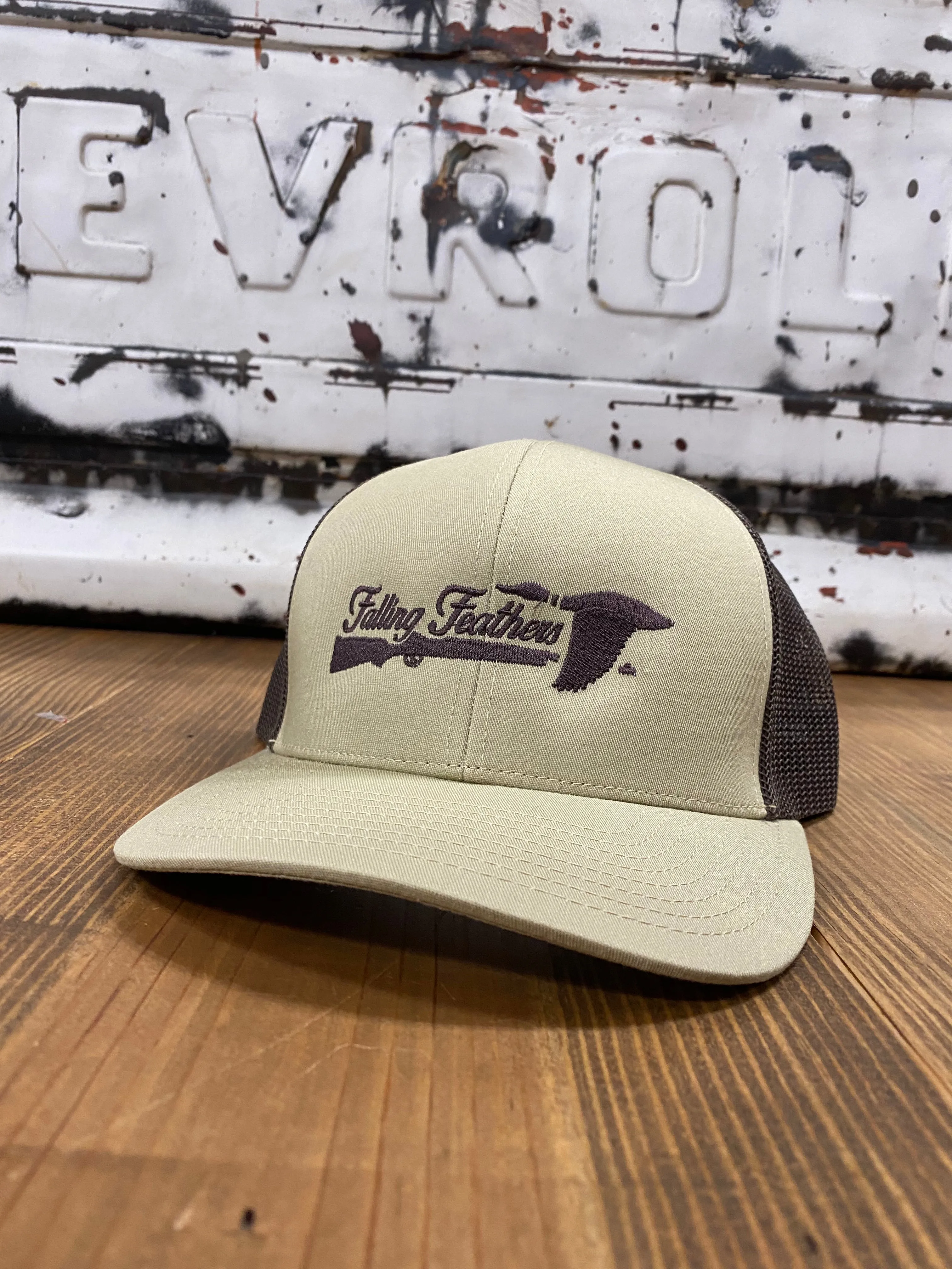 Falling Feathers Logo Trucker Cap
